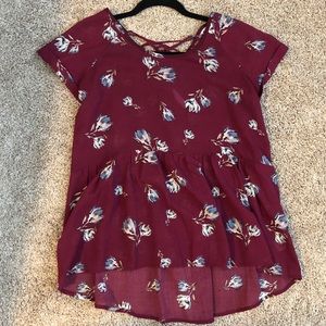 Peplum top with lace up back detail